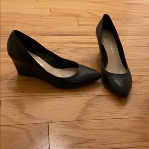 Closed toe wedge heel